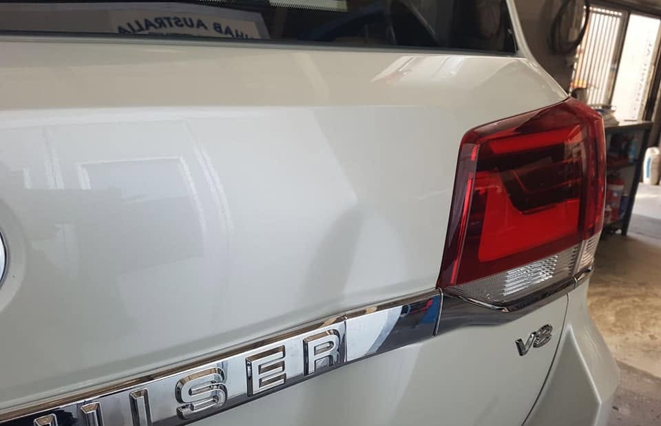 A Landcruiser rear quarter and tail light after a small tailgate repair
